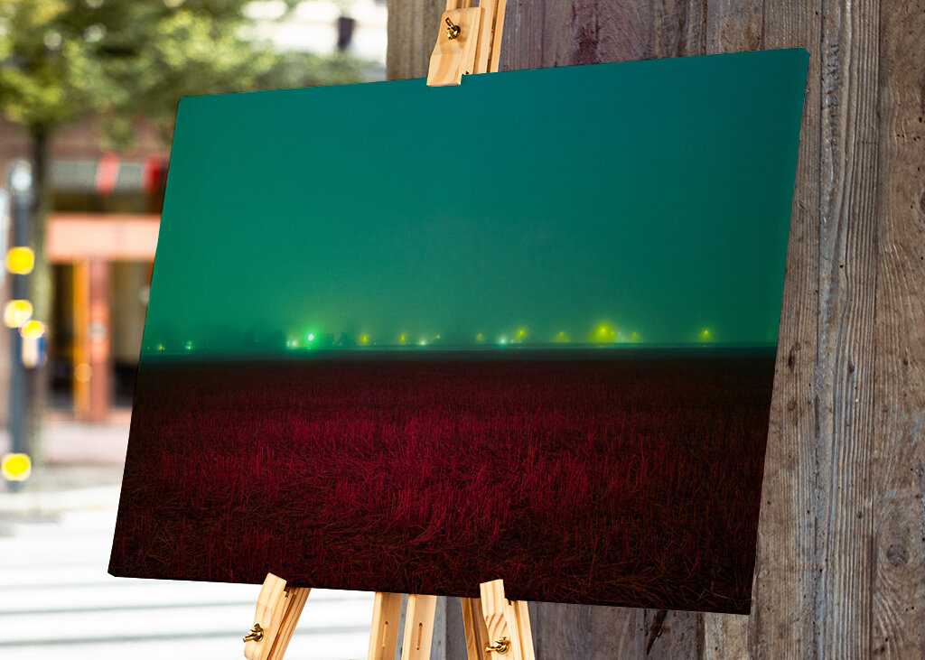 Red field under blue sky