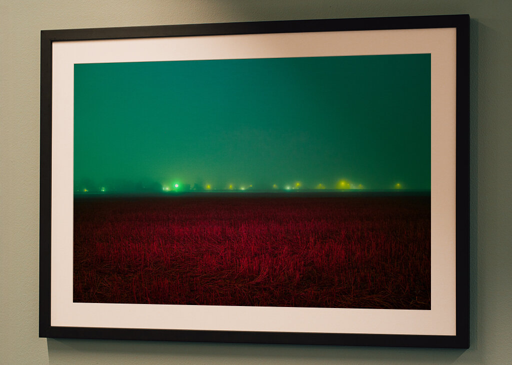 Red field under blue sky