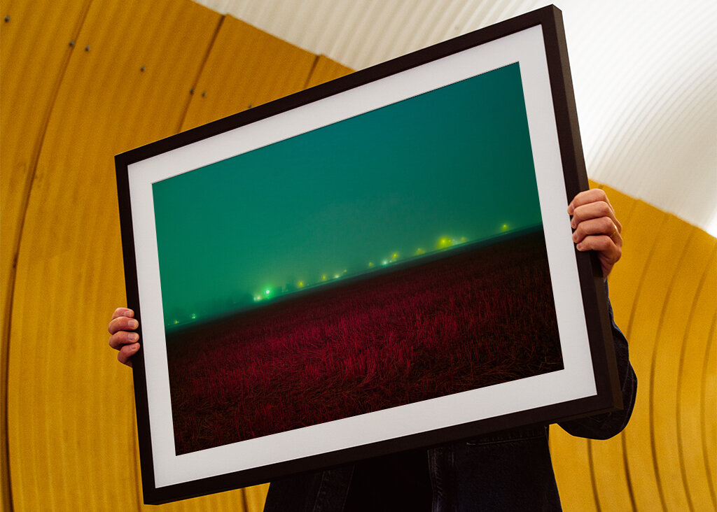 Red field under blue sky