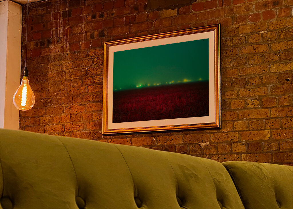 Red field under blue sky