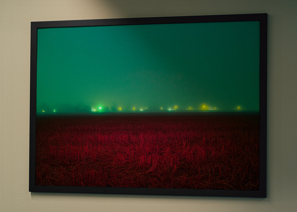 Red field under blue sky