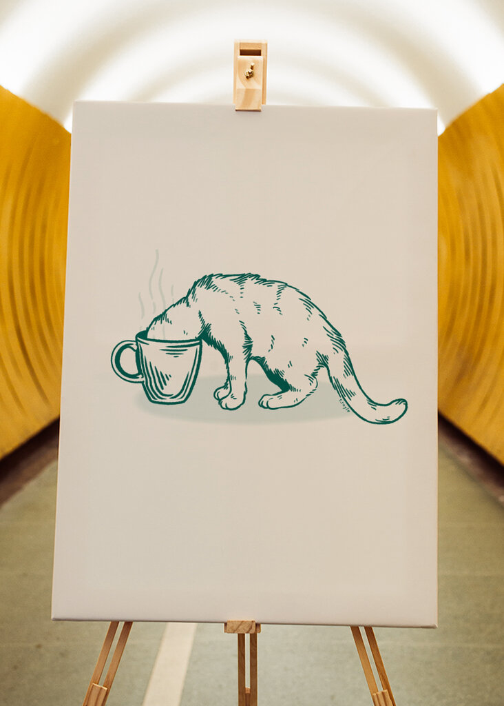 Gato do café no verde