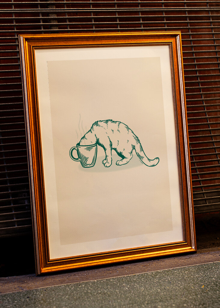 Gato do café no verde