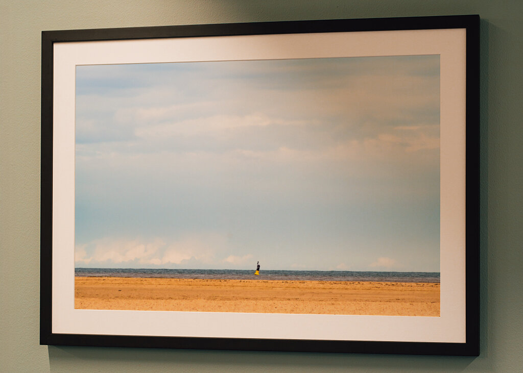 Solitude by the Shore: A Moment of Reflection