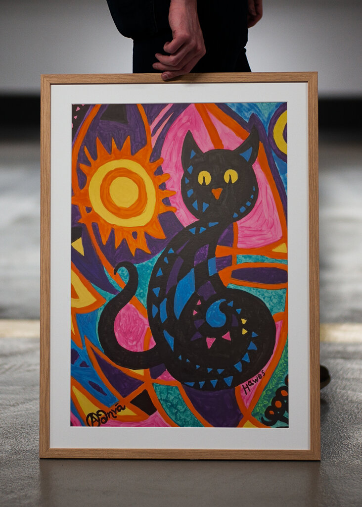 Whimsical Feline in a Colorful Abstract World