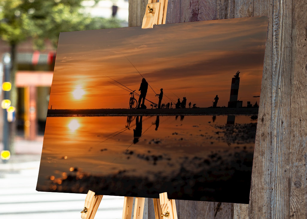 Fischer bei Sonnenuntergang