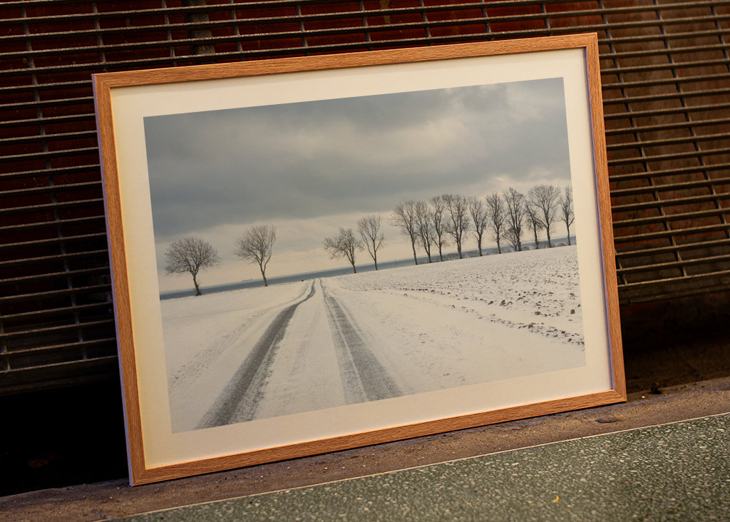 Snowy road towards the sea