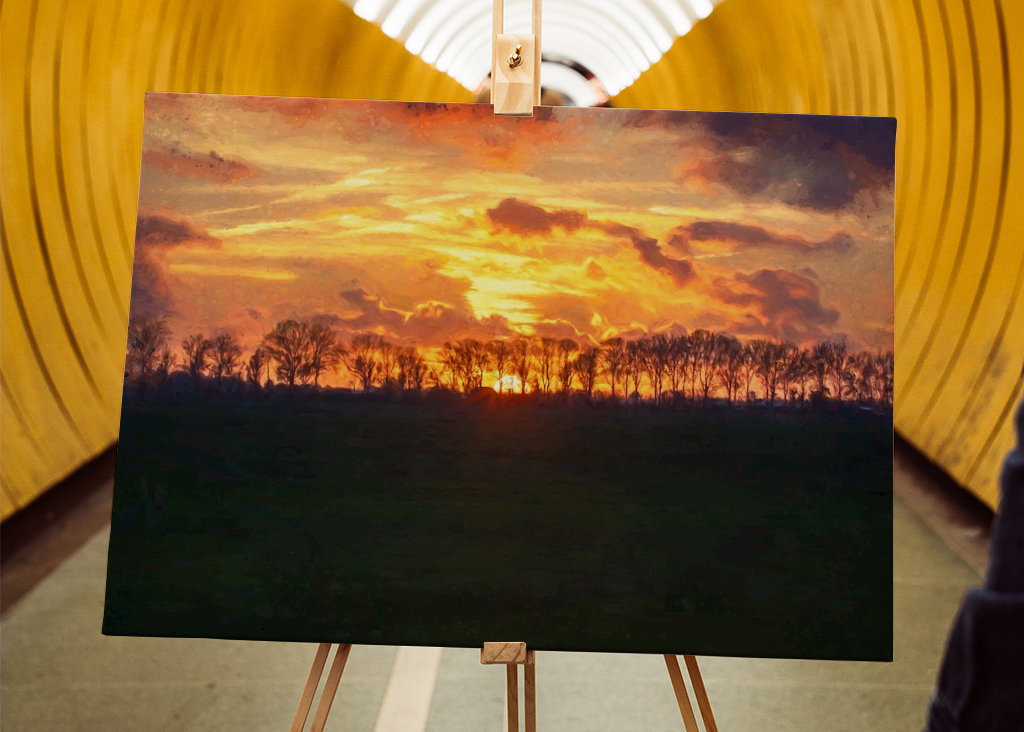 Západ slunce nad rovinatou krajinou