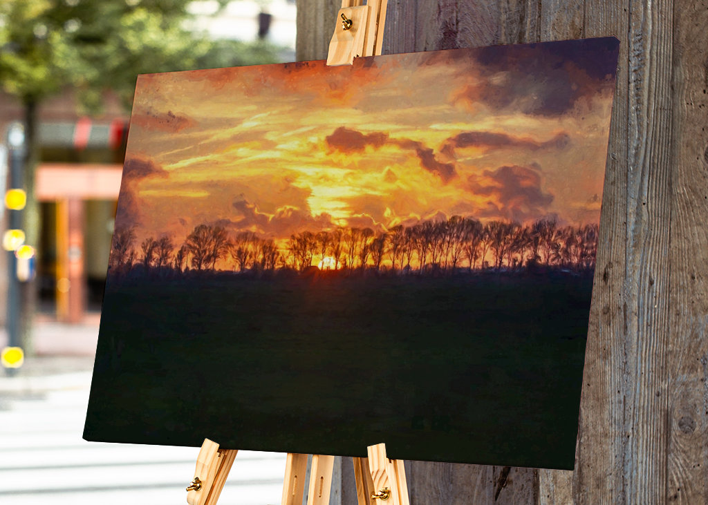Západ slunce nad rovinatou krajinou