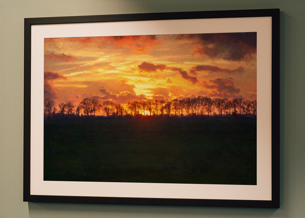 Západ slunce nad rovinatou krajinou