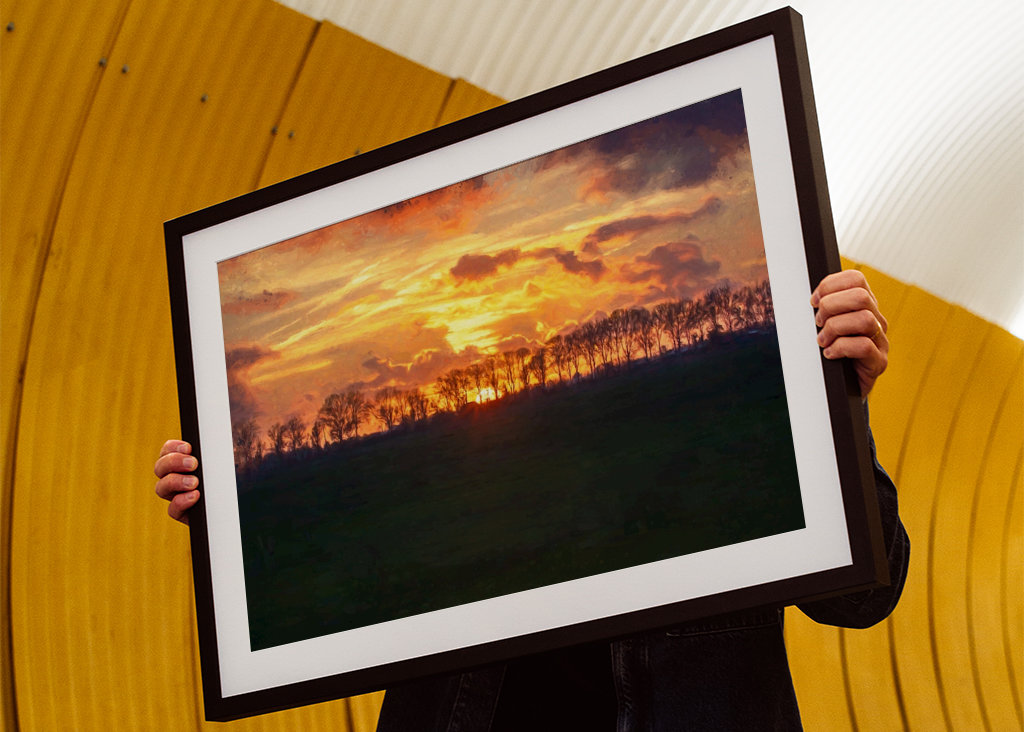 Západ slunce nad rovinatou krajinou