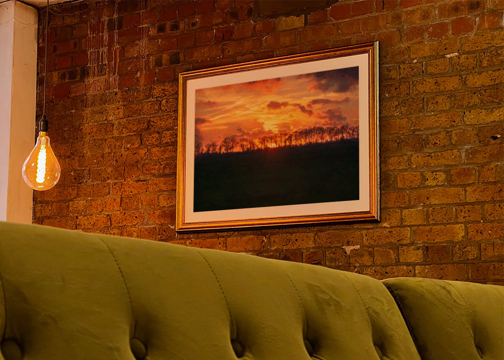 Západ slunce nad rovinatou krajinou