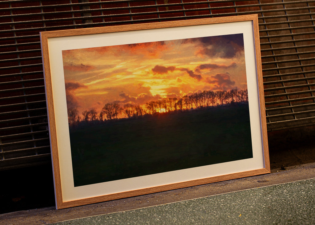 Západ slunce nad rovinatou krajinou