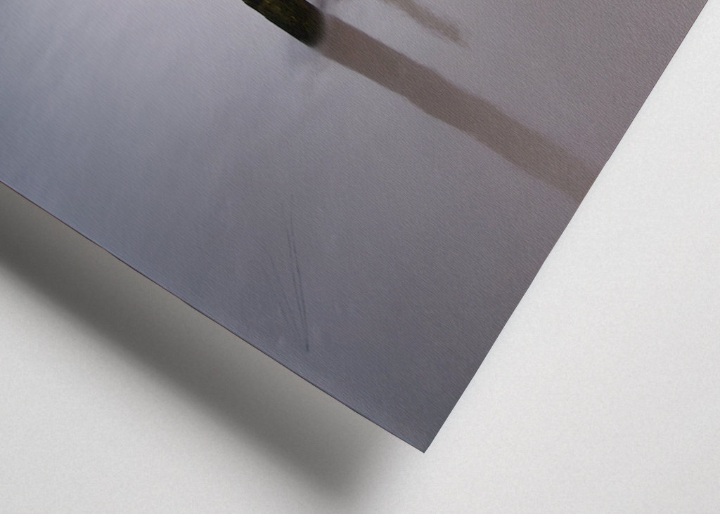 Holzstangen am Strand