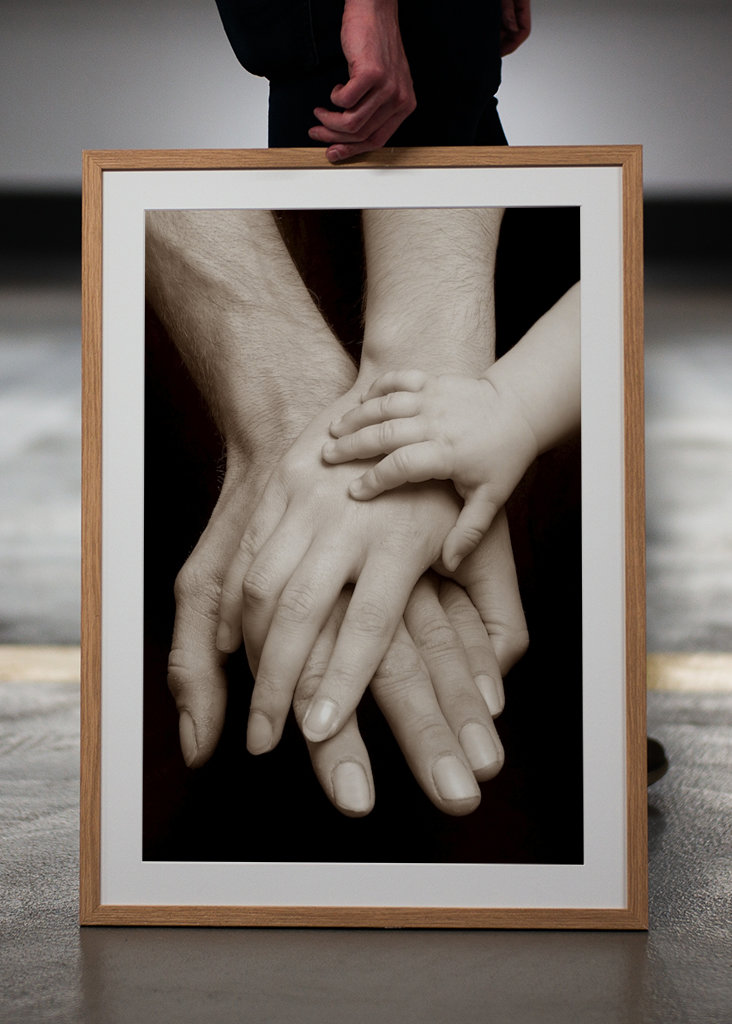 Hænder af en familie