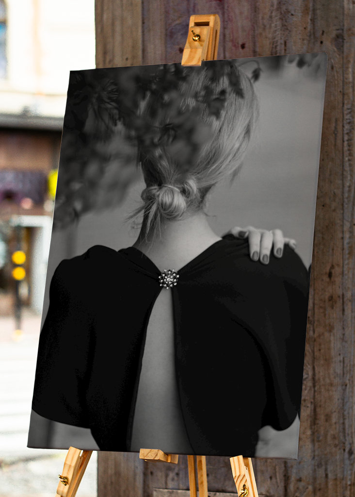 Detaljer om en klänning och kvinna