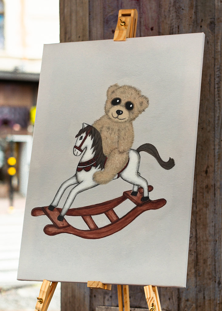 Teddy bear on a rocking horse
